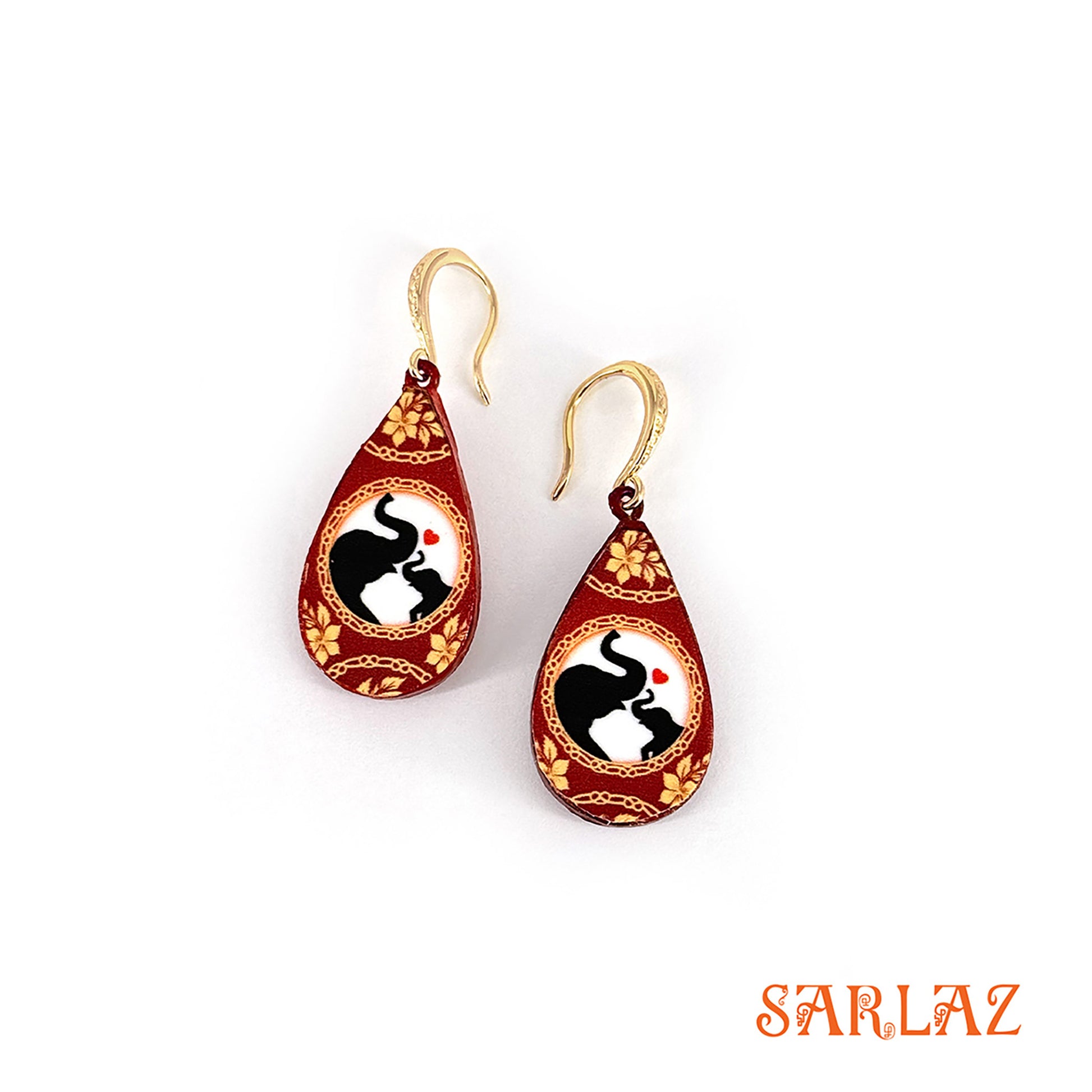 Teardrop-shaped earrings with elephant and her calf design on a white background, featuring the brand 'SARLAZ'.