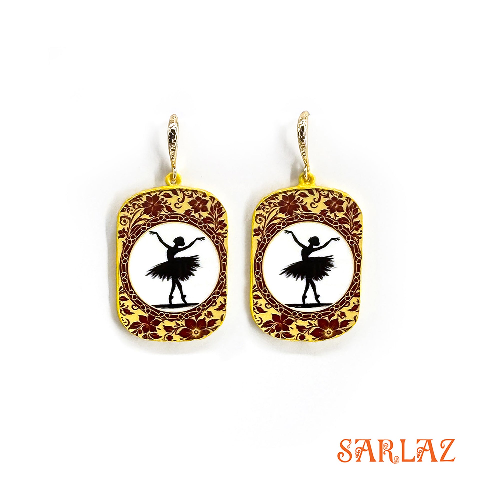 Pair of earrings with ballerina design on a white background, featuring the brand 'SARLAZ'.