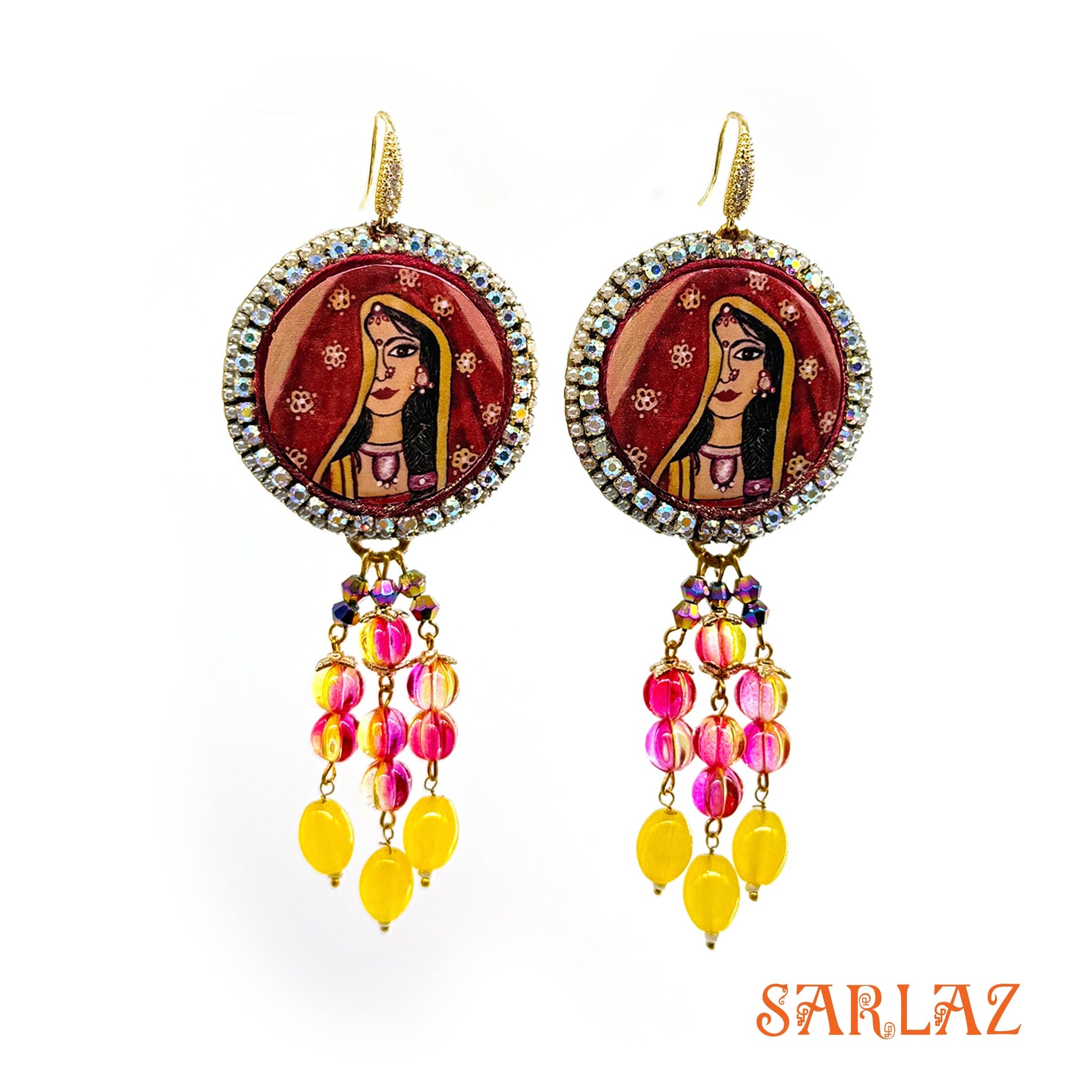 Colorful earrings with an Indian Bride design and beaded accents on a white background, featuring the brand 'SARLAZ'.