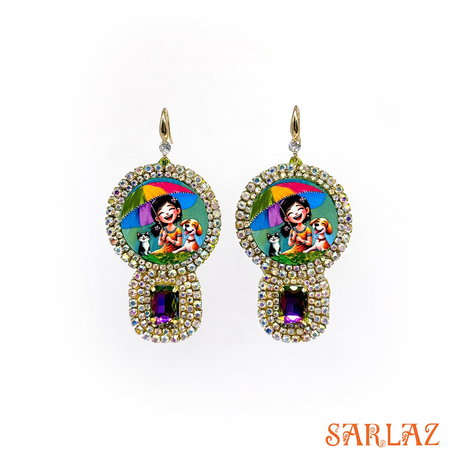 Pair of earrings with colourful design of a girl, with her dog and cat and 'SARLAZ' branding on a white background
