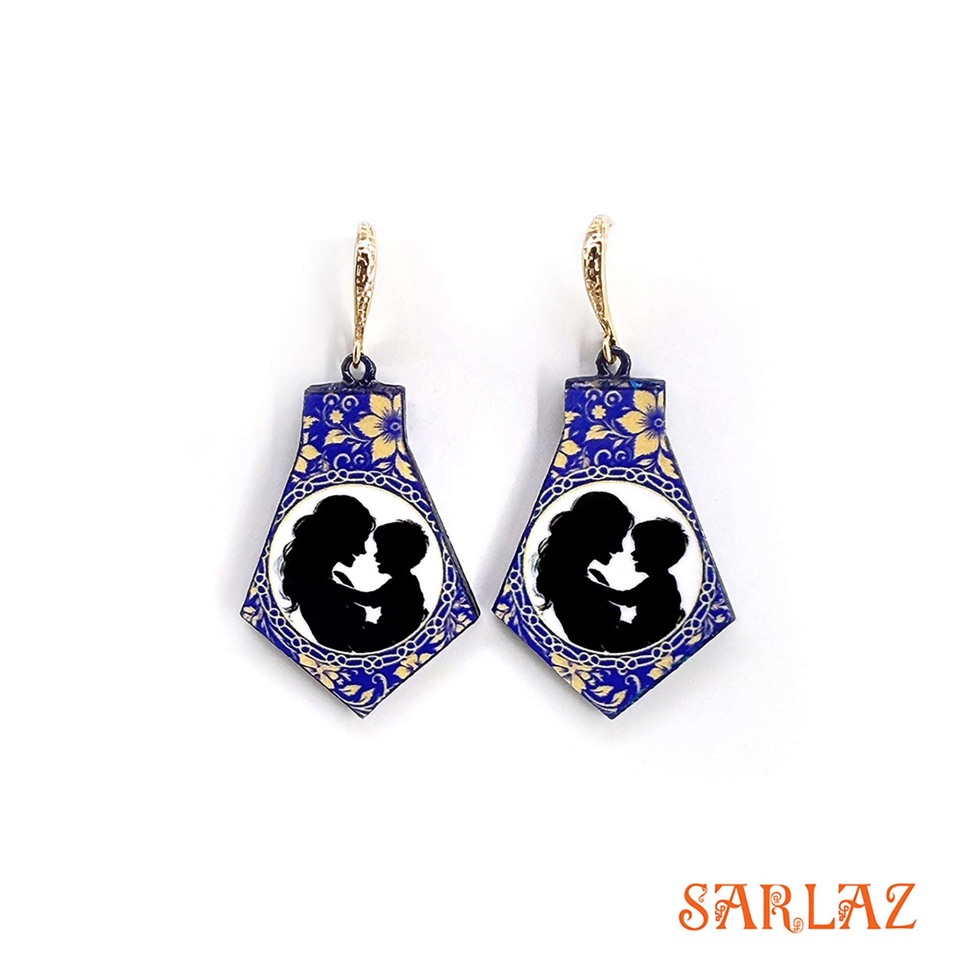 Pair of earrings with blue and gold design featuring a silhouette of a mother and her son, branded 'SARLAZ'.