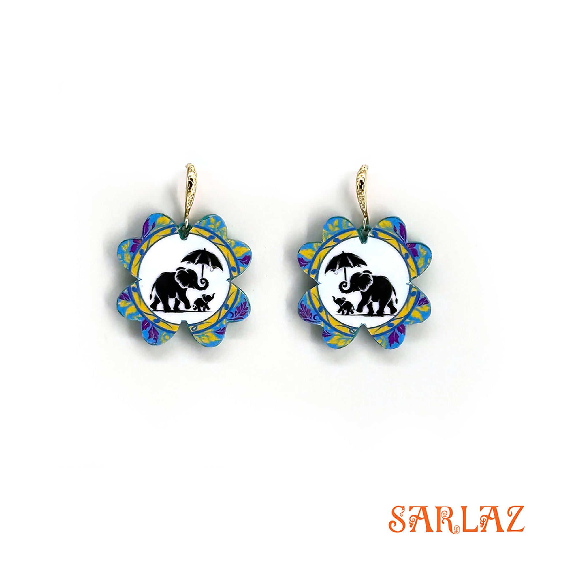 Pair of earrings with mother elephant holding umbrella for her baby, design on a white background, featuring the brand 'SARLAZ'.