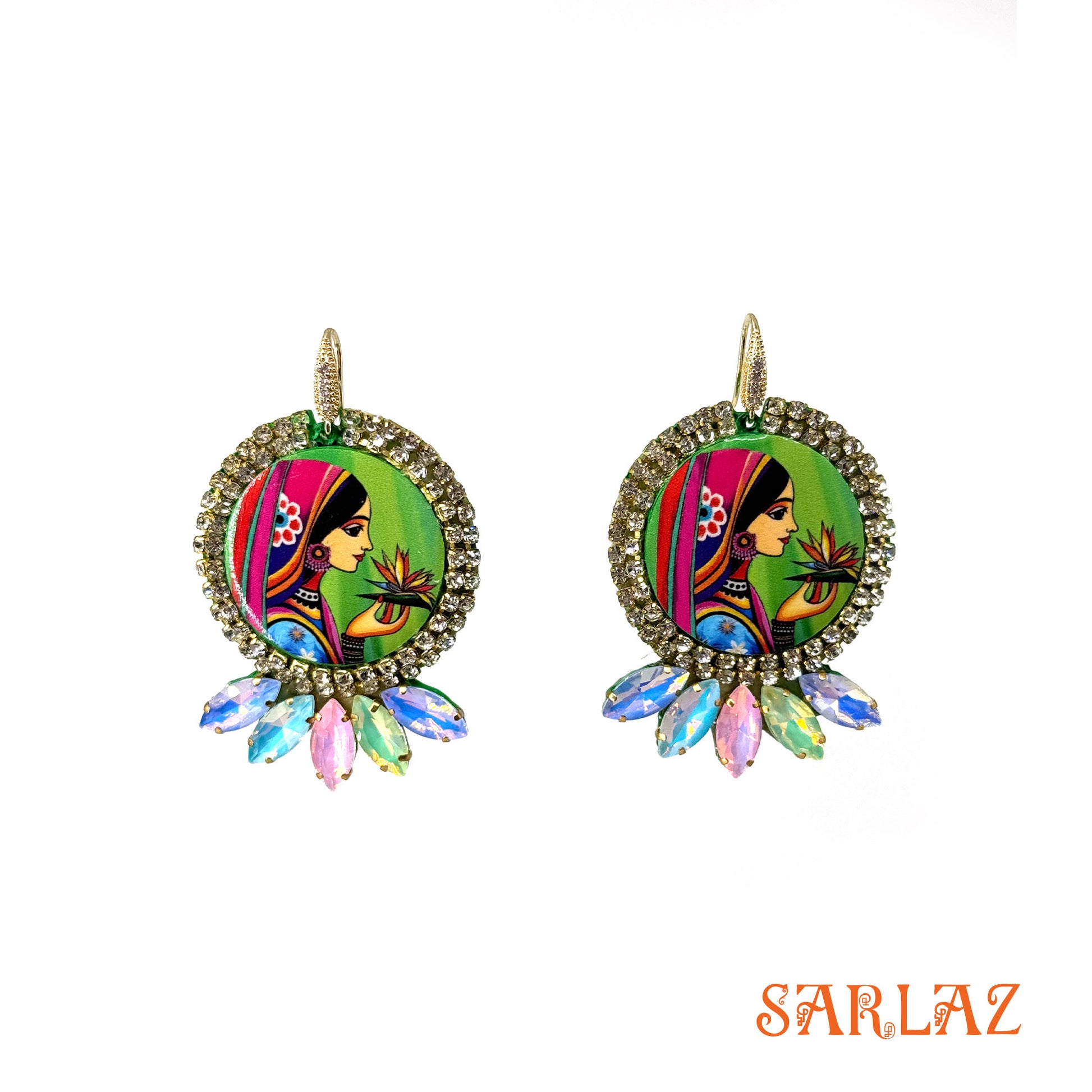 Colorful earrings with a woman's face design and rhinestone accents on a white background, featuring the brand 'SARLAZ'.